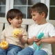 Melii Snack Container With Finger Trap - Yellow Lion